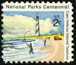 Cape Hatteras National Seashore - Lighthouse and Fishermen United States Postage Stamp | National Parks Centennial