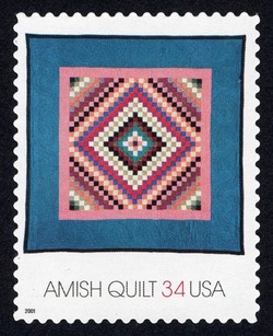 Blue Quilt With Pink Square - Sunshine and Shadow Quilt United States Postage Stamp | Amish Quilts
