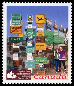 Sign Post Forest, Watson Lake, YT - WA Canada Postage Stamp | Roadside Attractions